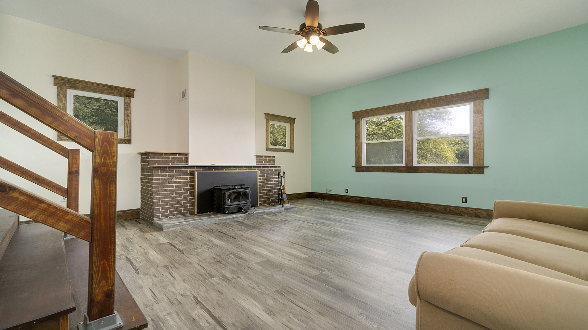503 West Devils Backbone Road Oregon, IL 61061 - Photo 26 of 46 a living room with furniture a fireplace and a window