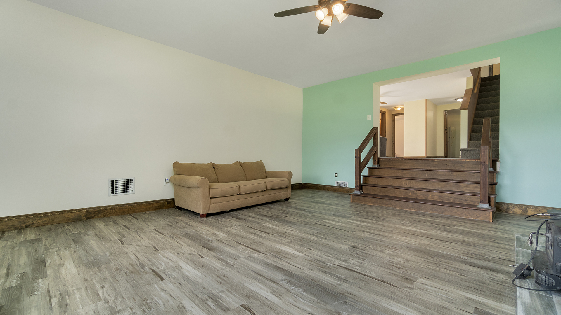 503 West Devils Backbone Road Oregon, IL 61061 - Photo 29 of 46 a living room with furniture and a ceiling fan