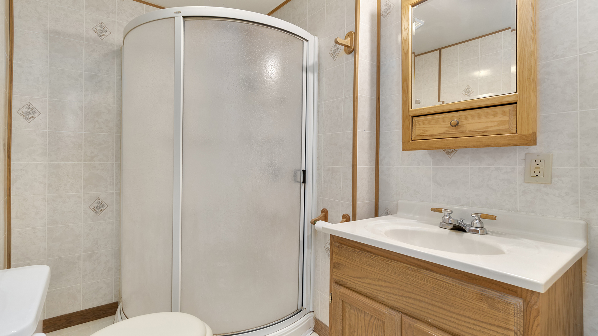 503 West Devils Backbone Road Oregon, IL 61061 - Photo 40 of 46 a bathroom with a sink a toilet and shower