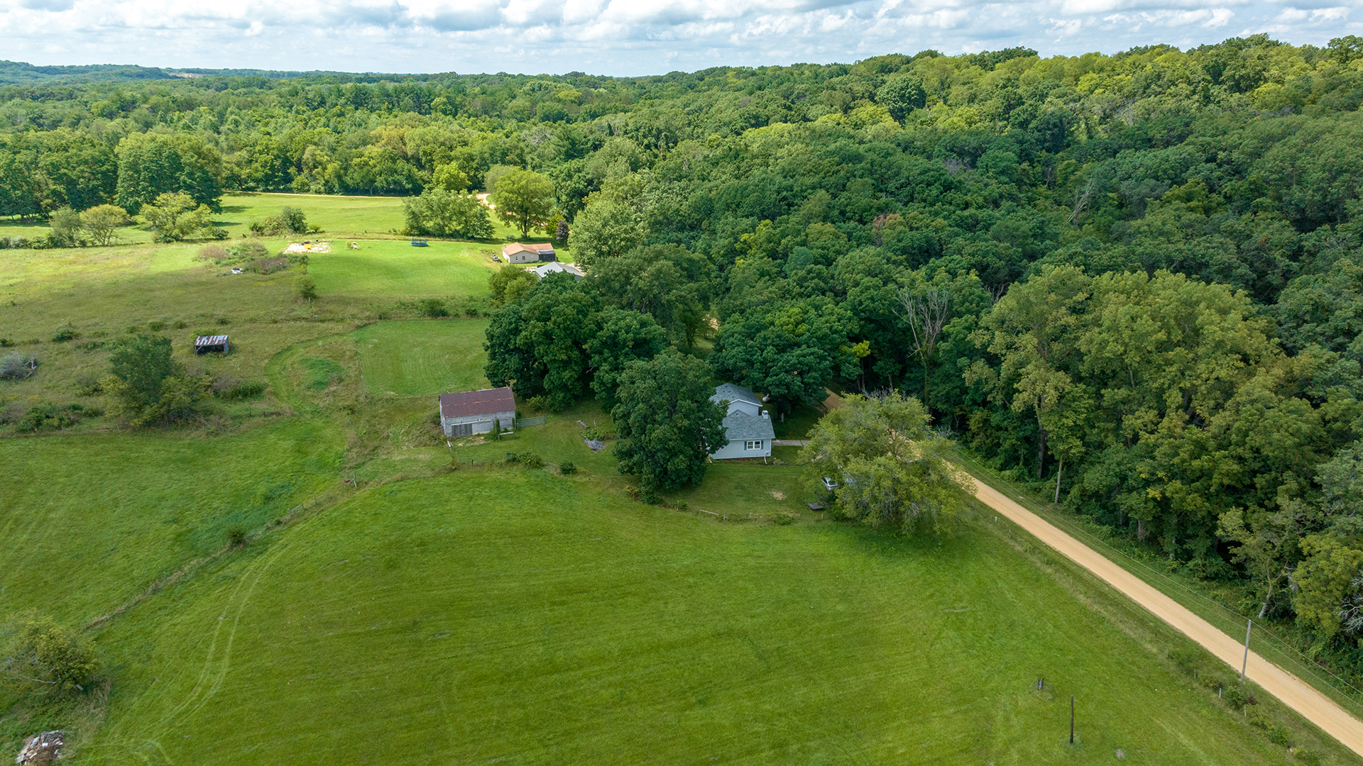 503 West Devils Backbone Road Oregon, IL 61061 - Photo 4 of 46 a view of a green field with lots of trees