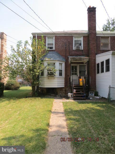 3704 Clarinth Road Baltimore, MD 21215 - Photo 2 of 3 a view of swimming pool with outdoor seating and a yard