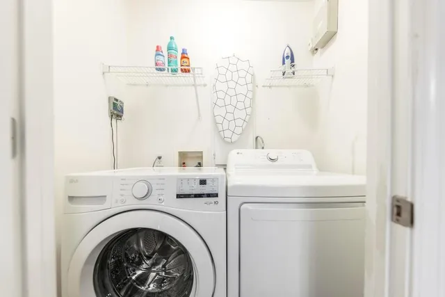 a utility room with dryer and washer