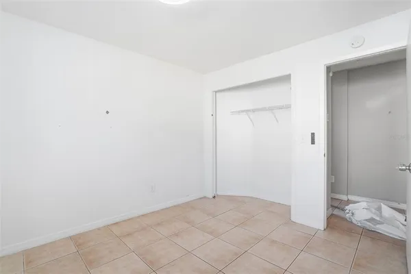 a view of room with floor to ceiling window and floor