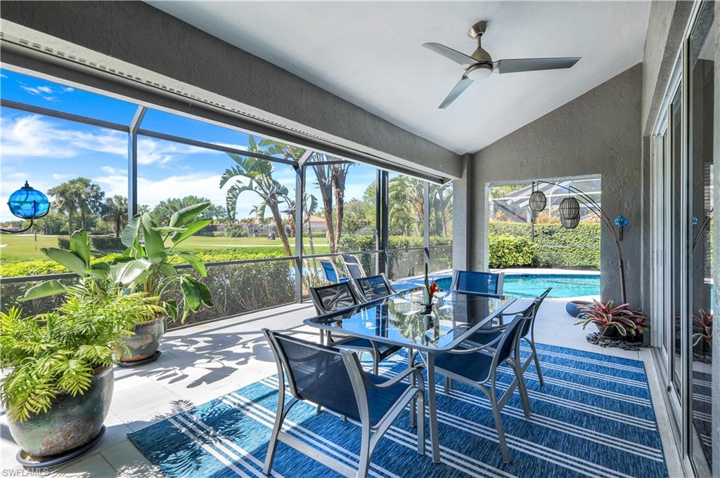 11831 Quail Village Way Naples, FL 34119 - Photo 7 of 32 a view of a dining room with furniture window and outside view