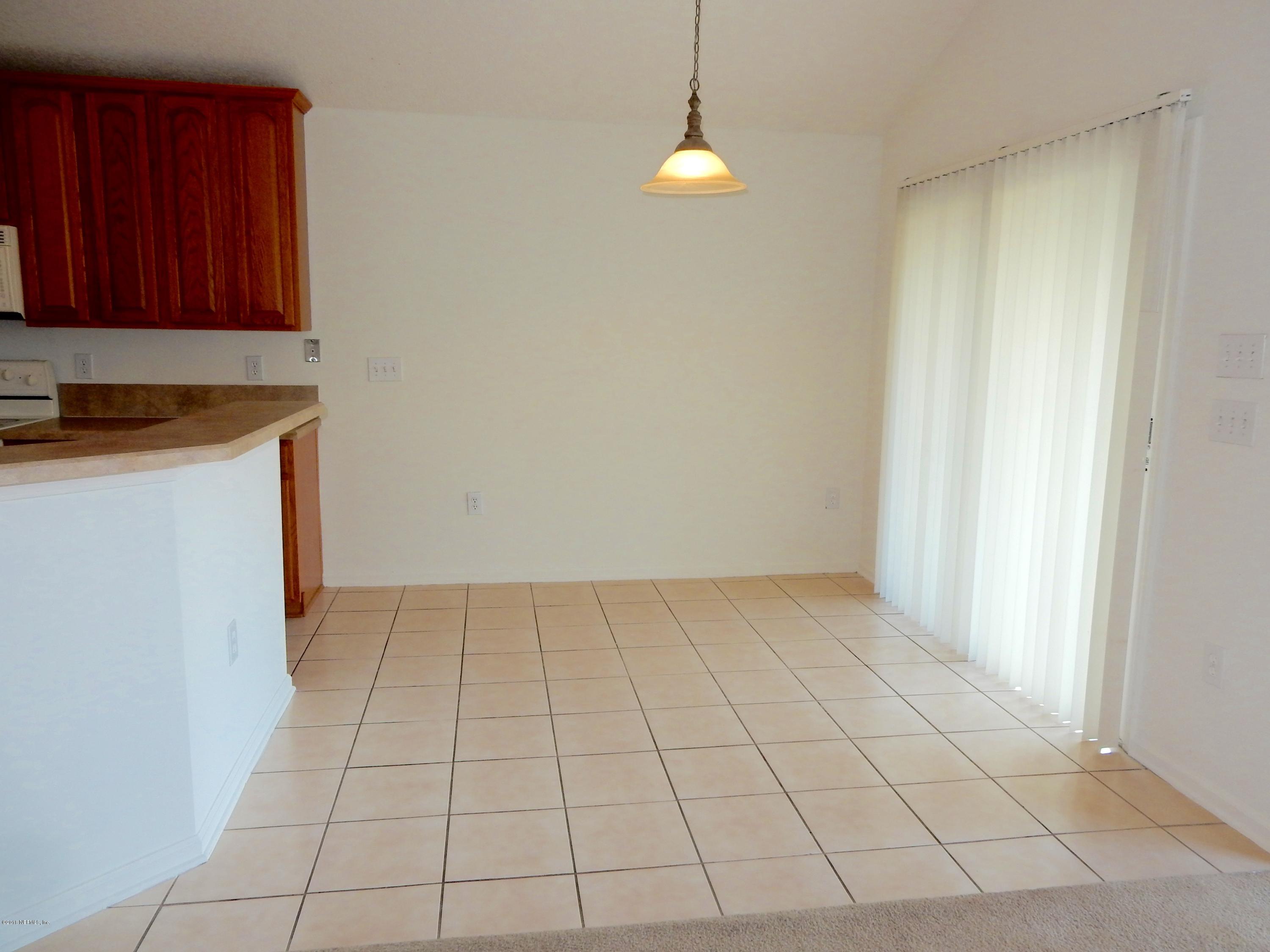 1528 Summerdown Way St. Johns, FL 32259 - Photo 12 of 28 a view of an empty room and wooden floor