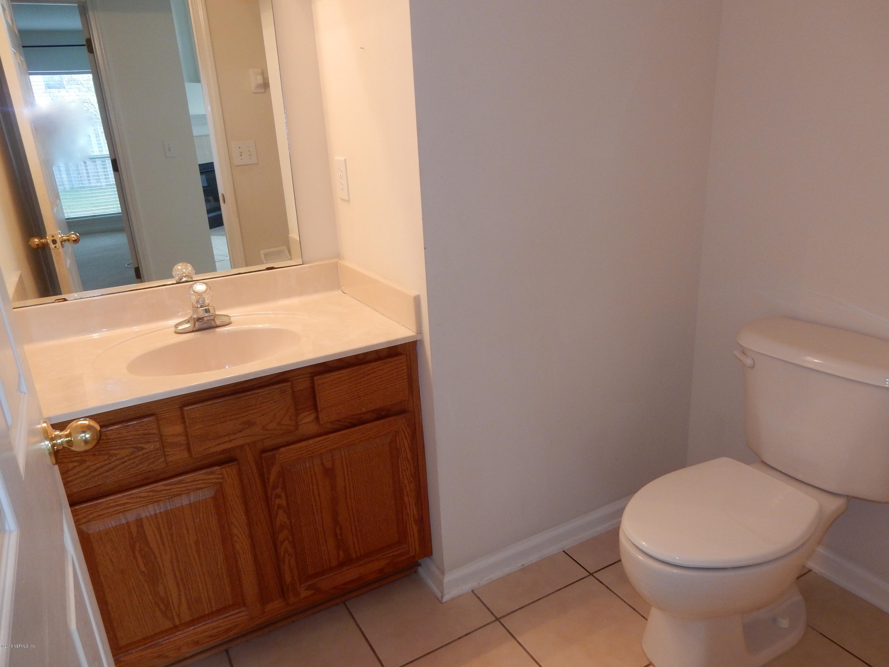 1528 Summerdown Way St. Johns, FL 32259 - Photo 15 of 28 a bathroom with a sink and a toilet