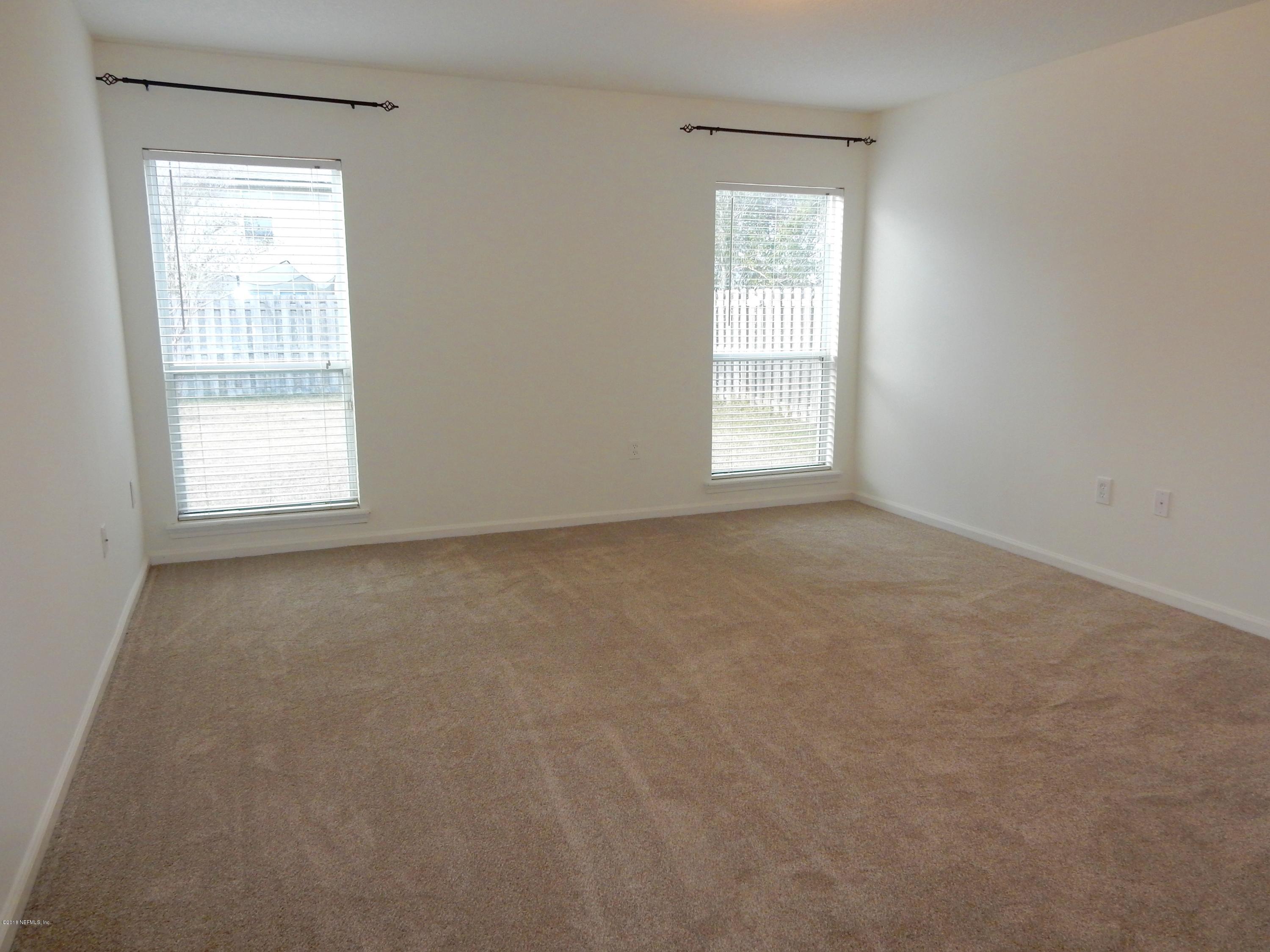 1528 Summerdown Way St. Johns, FL 32259 - Photo 16 of 28 an empty room with a window