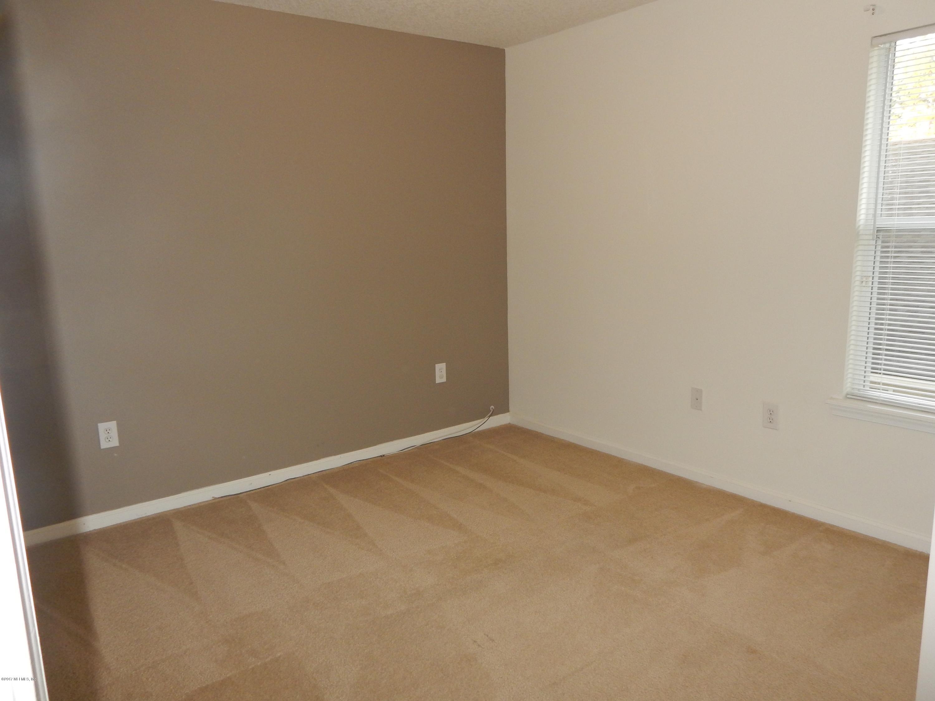 1528 Summerdown Way St. Johns, FL 32259 - Photo 22 of 28 a view of an empty room with a window