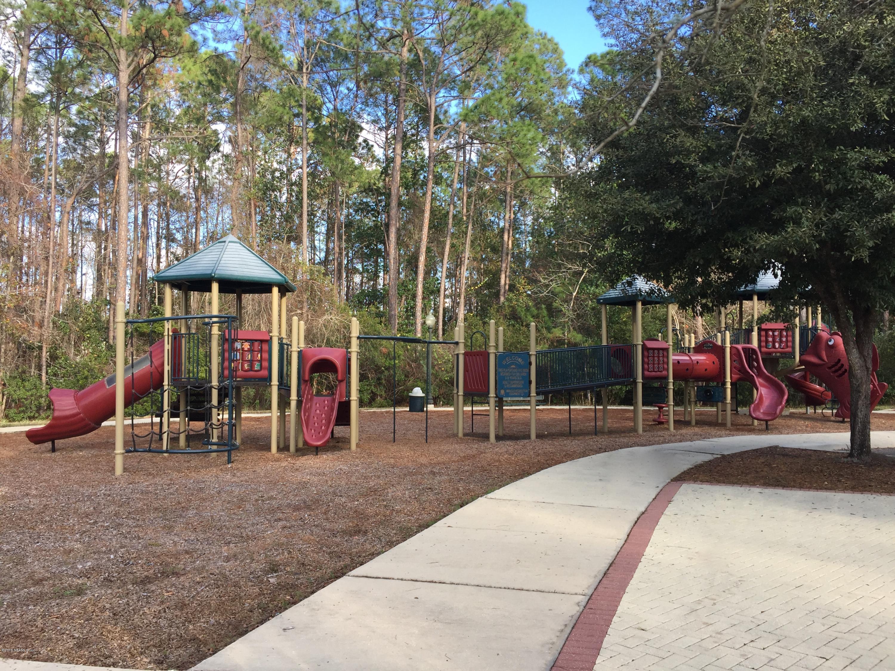 1528 Summerdown Way St. Johns, FL 32259 - Photo 28 of 28 a view of a park with sitting area