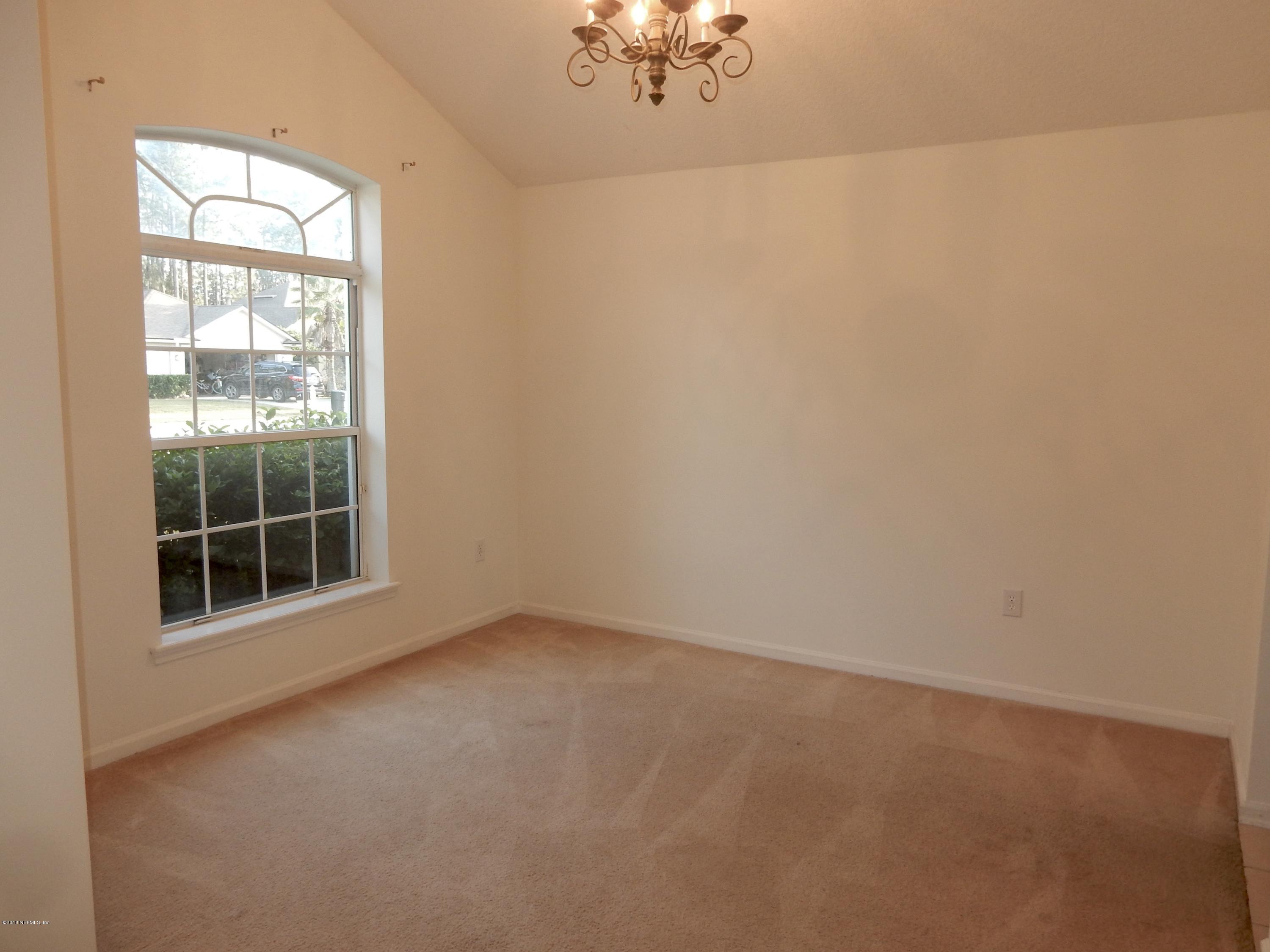 1528 Summerdown Way St. Johns, FL 32259 - Photo 5 of 28 an empty room with a window