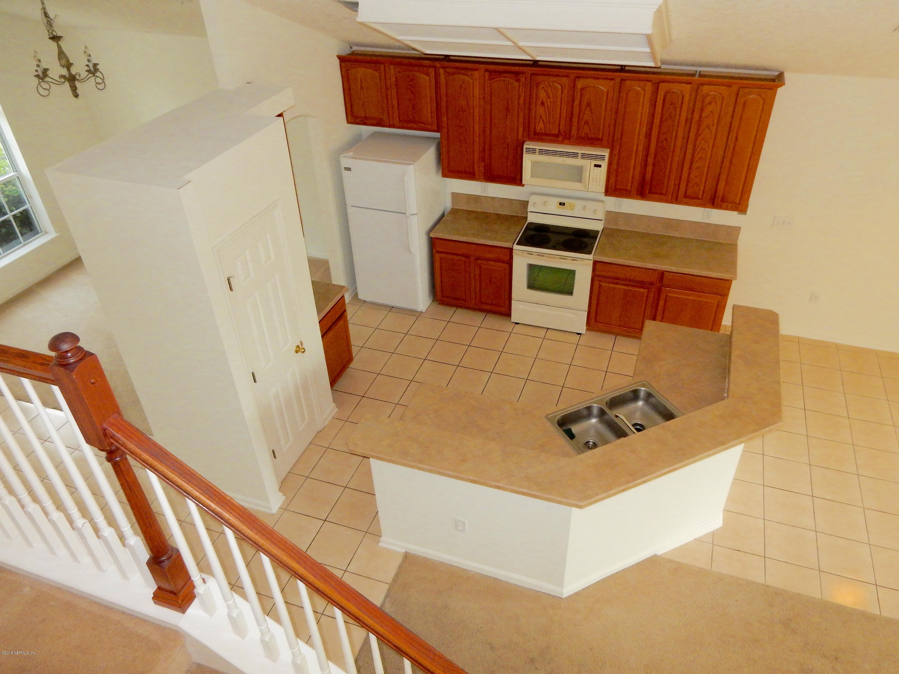 1528 Summerdown Way St. Johns, FL 32259 - Photo 9 of 28 a view of a kitchen with a sink