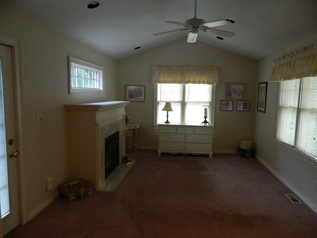 4619 Spring Brook Road Rockford, IL 61114 - Photo 23 of 32 a view of empty room with windows and ceiling fan