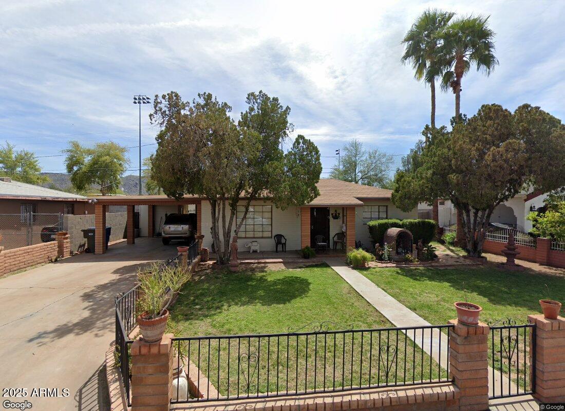 7 East Beautiful Lane Phoenix, AZ 85042 - Photo 1 of 26 a view of a patio with couches table and chairs and potted plants