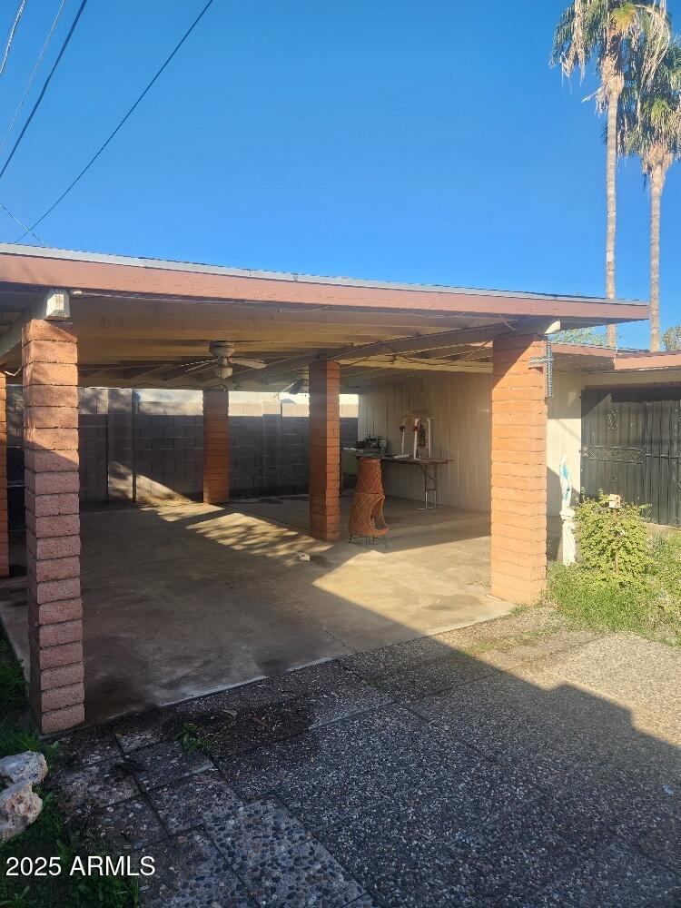7 East Beautiful Lane Phoenix, AZ 85042 - Photo 16 of 26 a view of yellow house with a yard