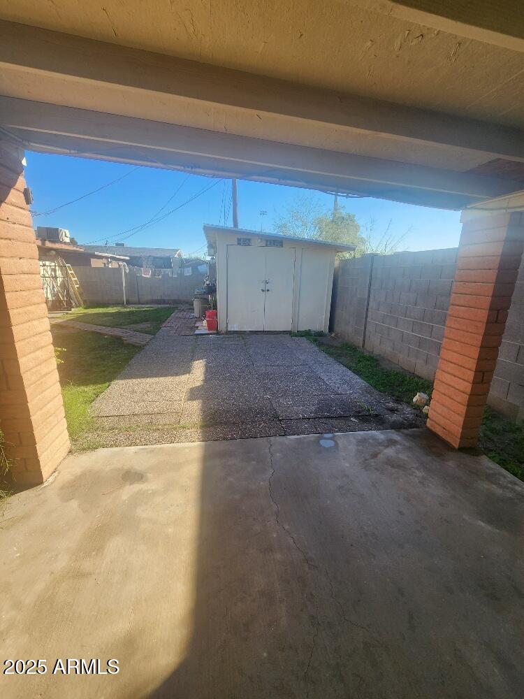 7 East Beautiful Lane Phoenix, AZ 85042 - Photo 18 of 26 a view of a garage