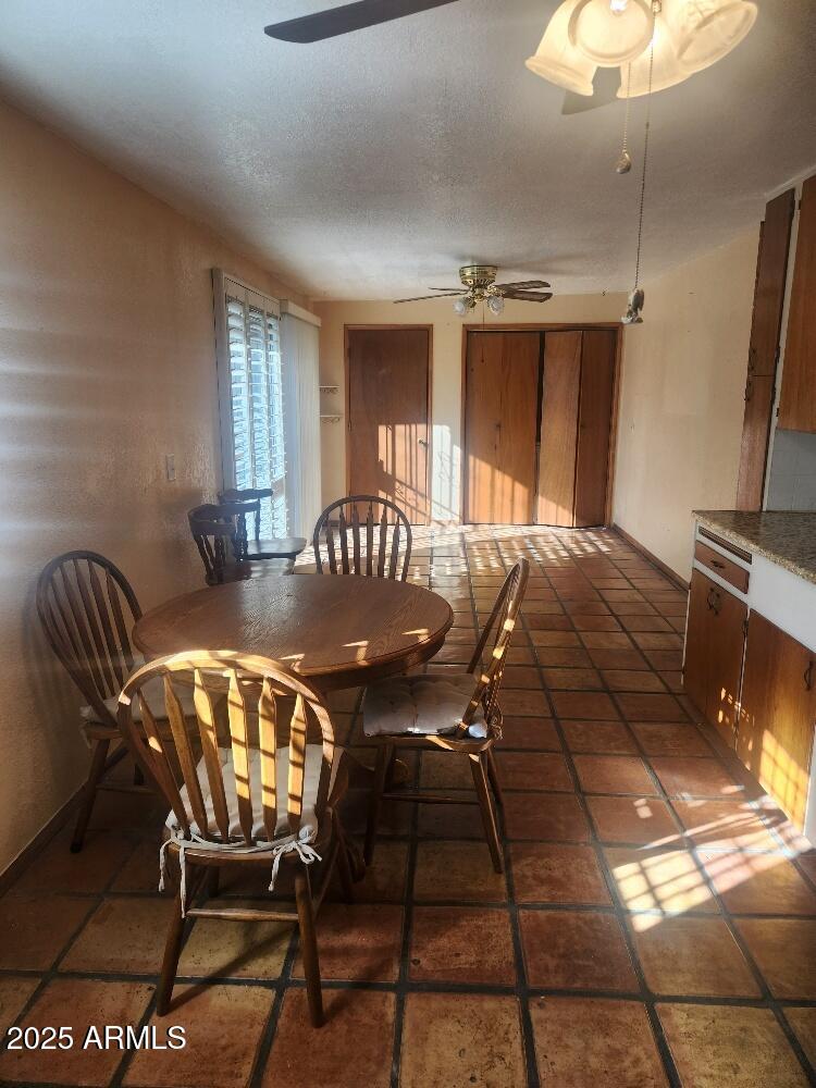 7 East Beautiful Lane Phoenix, AZ 85042 - Photo 21 of 26 a view of a dining room with furniture
