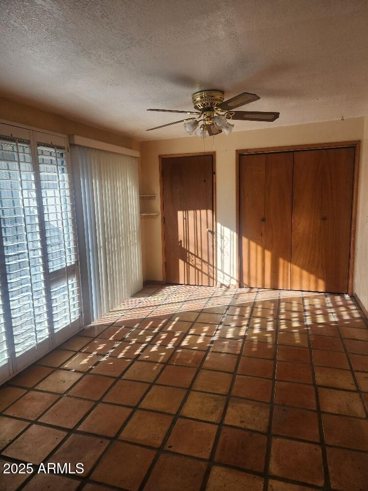 7 East Beautiful Lane Phoenix, AZ 85042 - Photo 8 of 26 a view of empty room with windows