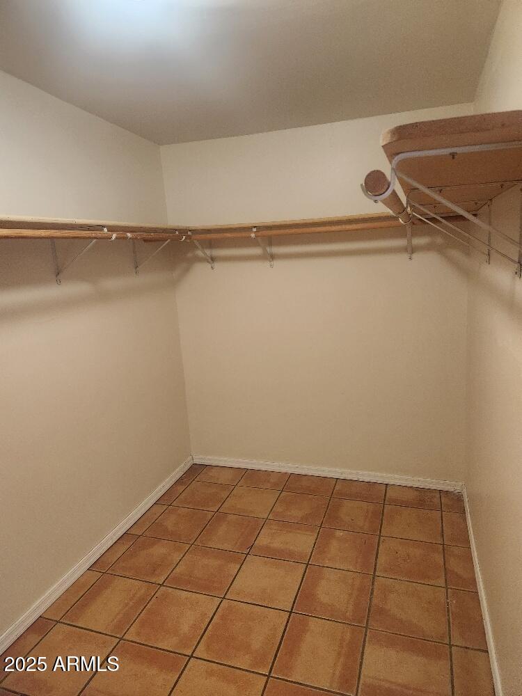 7 East Beautiful Lane Phoenix, AZ 85042 - Photo 10 of 26 a view of a room with racks on the wall