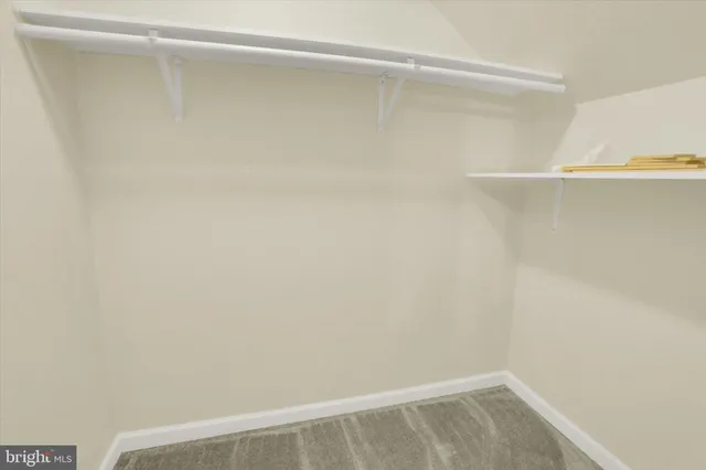 a view of small space with racks on the wall