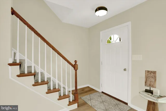 a view of staircase with white walls