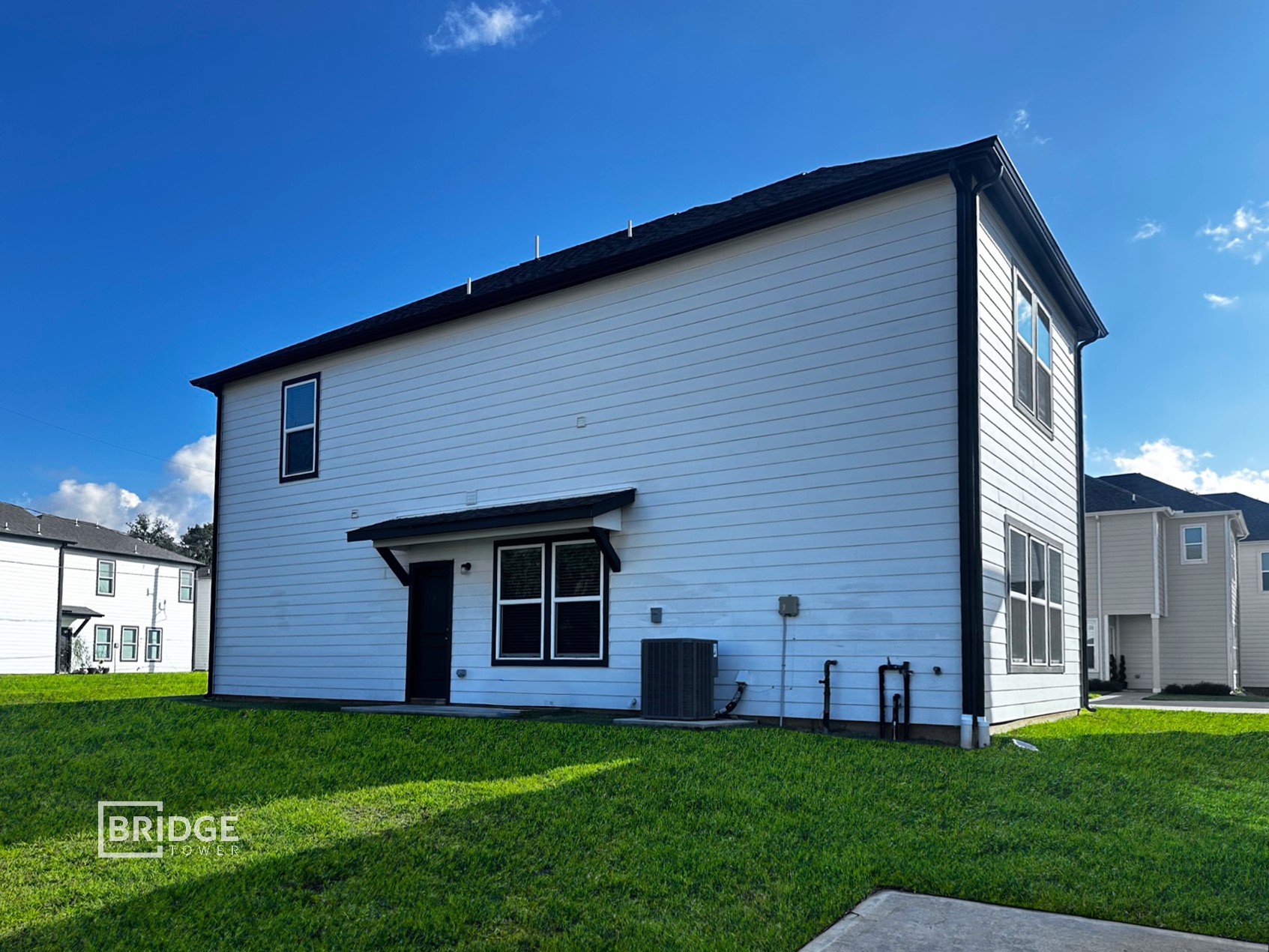 134 Pecan Lane Lake Jackson, TX 77566 - Photo 2 of 12 a front view of a house with a garden