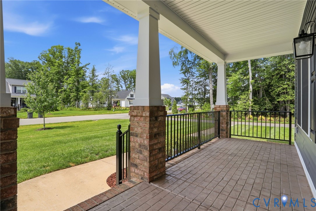 12040 Kenton Ridge Road Ashland, VA 23005 - Photo 39 of 54 Covered front porch featuring brick columns and bl