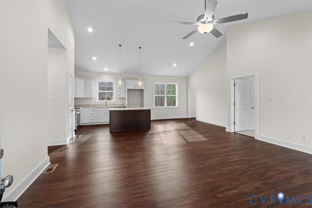 4522 Old Stage Road Freeman, VA 23856 - Photo 11 of 51 a view of kitchen and hall with wooden floor