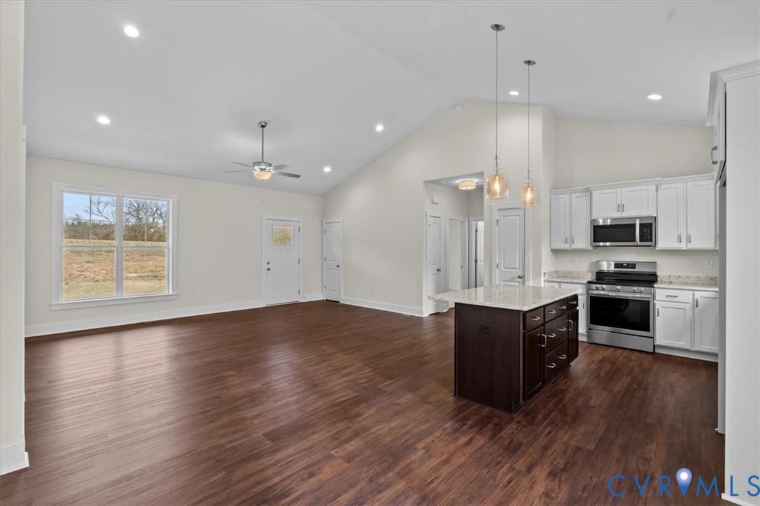 4522 Old Stage Road Freeman, VA 23856 - Photo 14 of 51 a view of kitchen with sink microwave and stove