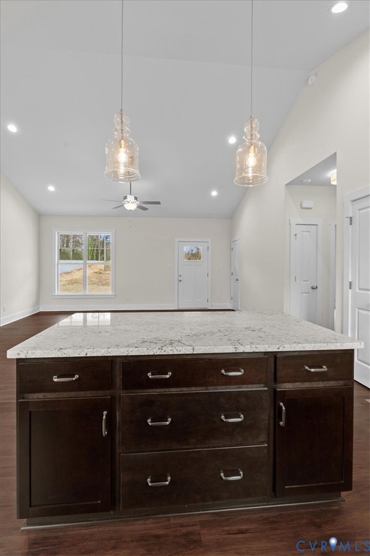 4522 Old Stage Road Freeman, VA 23856 - Photo 22 of 51 a view of a granite counter top a stove and a window