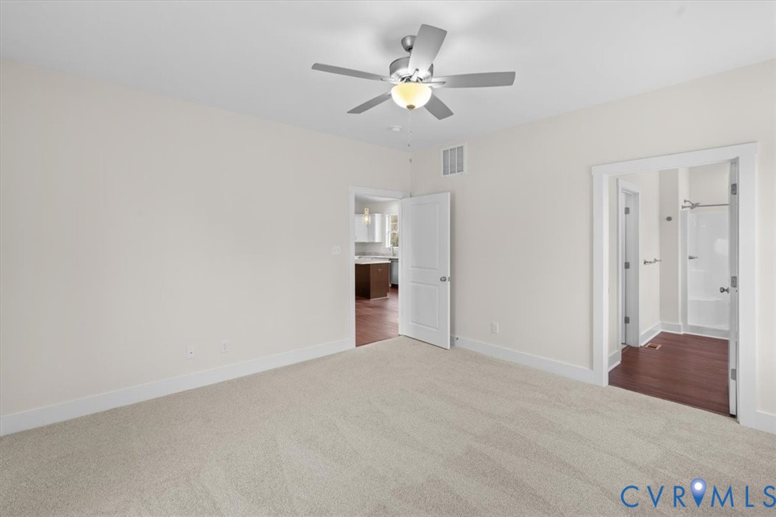 4522 Old Stage Road Freeman, VA 23856 - Photo 27 of 51 a view of an empty room with chandelier fan