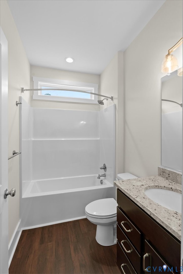 4522 Old Stage Road Freeman, VA 23856 - Photo 37 of 51 a bathroom with a granite countertop sink toilet and shower