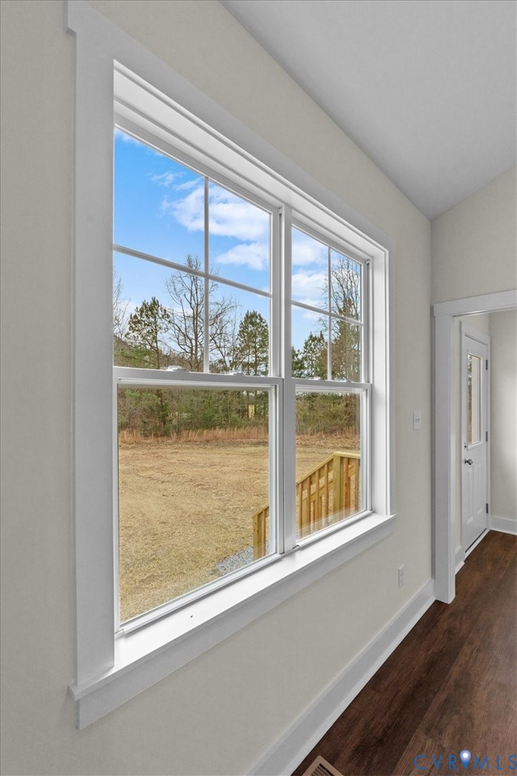 4522 Old Stage Road Freeman, VA 23856 - Photo 41 of 51 a view of a room that has a large window and wooden floor