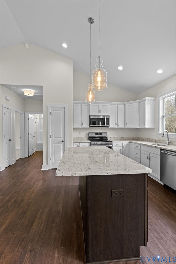 4522 Old Stage Road Freeman, VA 23856 - Photo 42 of 51 a large kitchen with lots of counter space sink refrigerator and cabinets