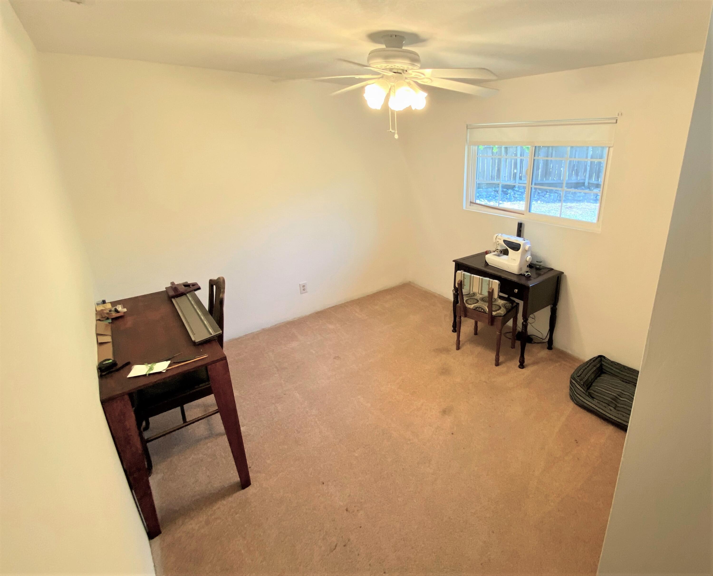 40968 Grouse Drive Three Rivers, CA 93271 - Photo 17 of 31 a view of a workspace with furniture and a window