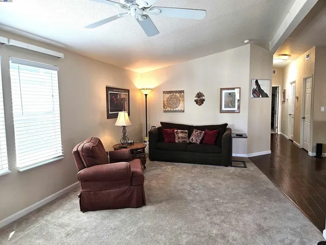 a bedroom with a bed and couch