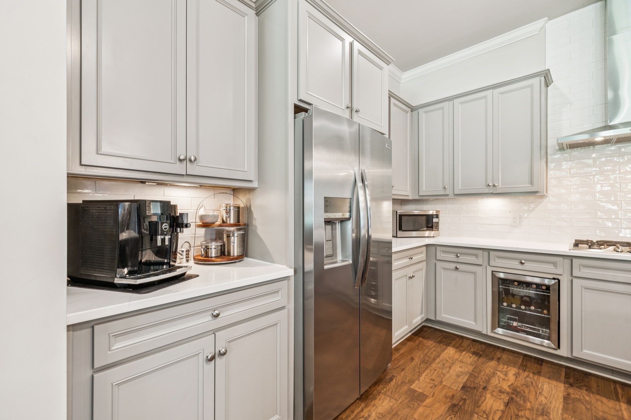 737 Alameda Avenue Nolensville, TN 37135 - Photo 12 of 55 a kitchen with stainless steel appliances granite countertop a refrigerator sink and cabinets