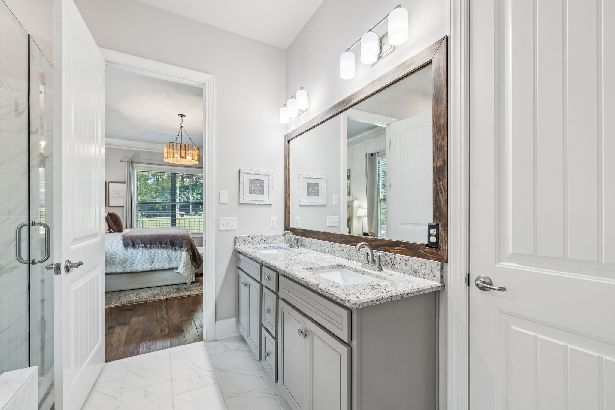737 Alameda Avenue Nolensville, TN 37135 - Photo 21 of 55 a bathroom with a granite countertop sink and a mirror
