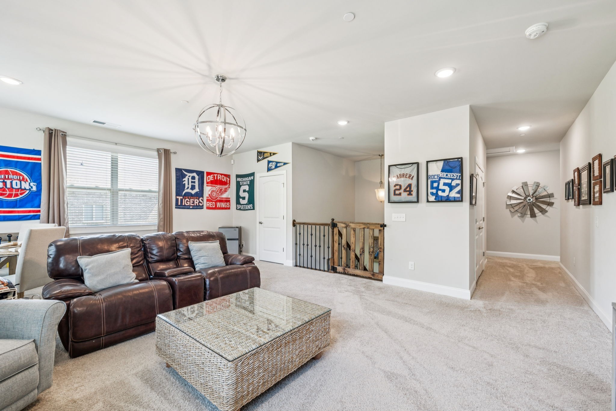 737 Alameda Avenue Nolensville, TN 37135 - Photo 28 of 55 a living room with furniture and a chandelier