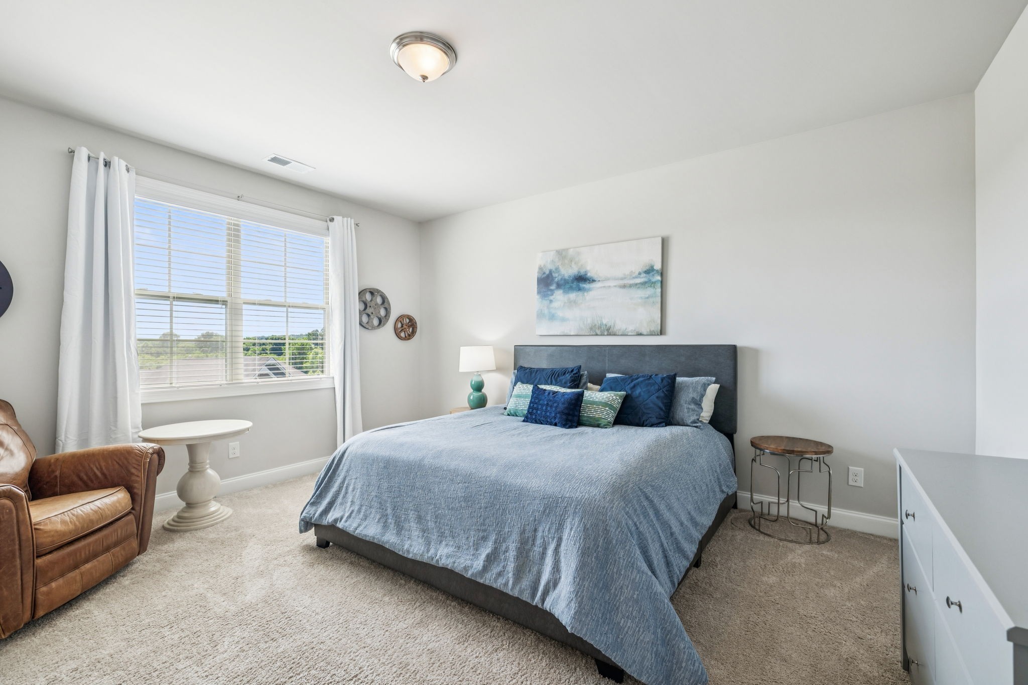 737 Alameda Avenue Nolensville, TN 37135 - Photo 35 of 55 a bedroom with a bed a couch and dresser