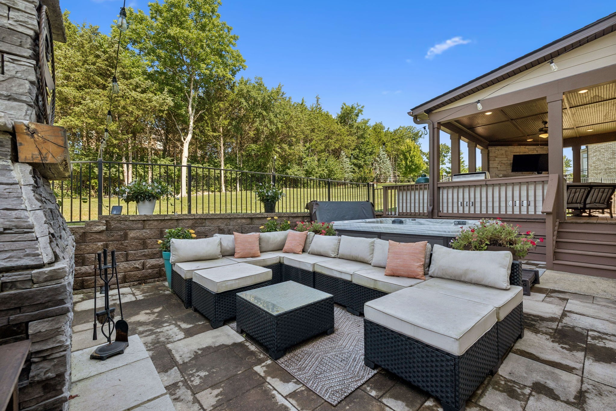 737 Alameda Avenue Nolensville, TN 37135 - Photo 43 of 55 a view of a patio with couches and a table and chairs with wooden fence