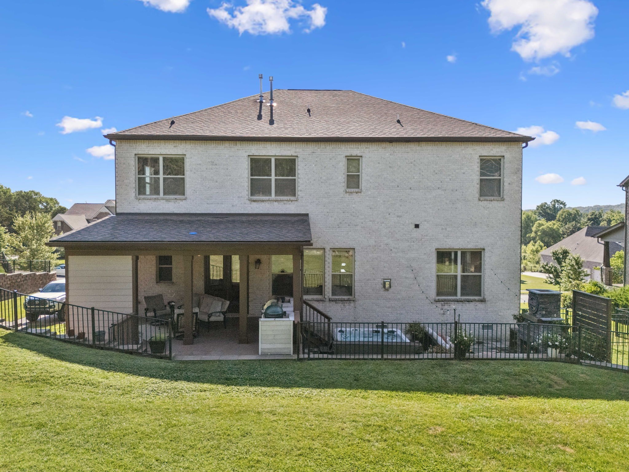 737 Alameda Avenue Nolensville, TN 37135 - Photo 45 of 55 a front view of a house with a yard table and chairs