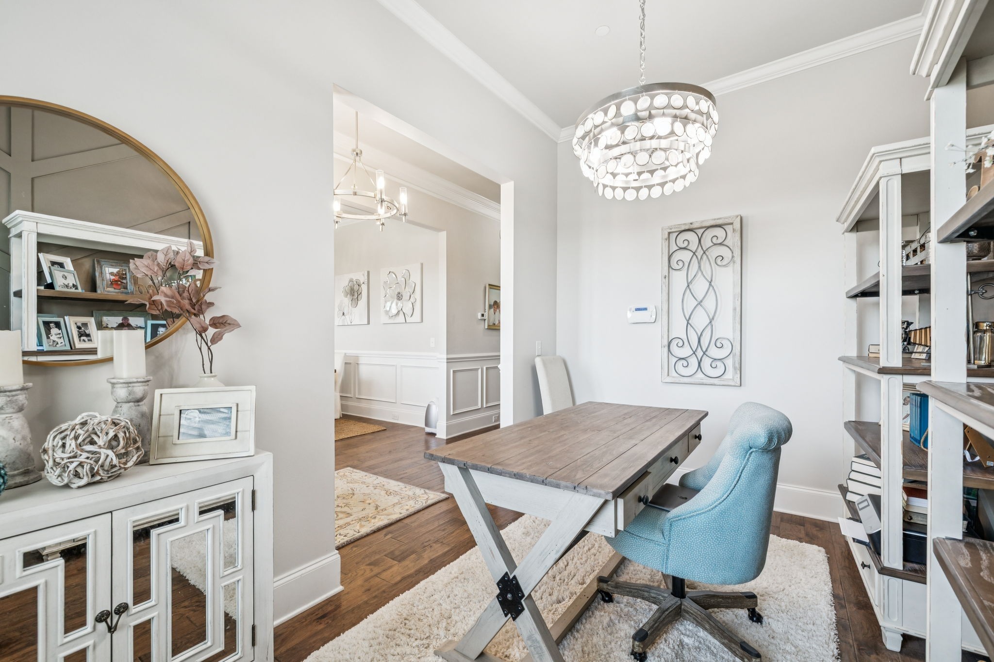 737 Alameda Avenue Nolensville, TN 37135 - Photo 6 of 55 a view of a dining room with furniture and a chandelier