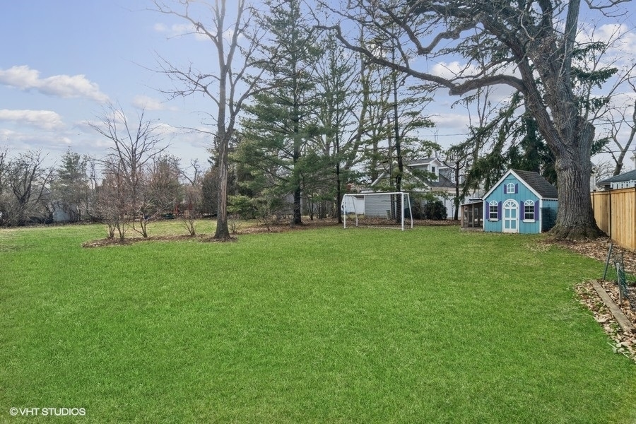 162 Akenside Road Riverside, IL 60546 - Photo 42 of 42 a view of green field with tree in the background