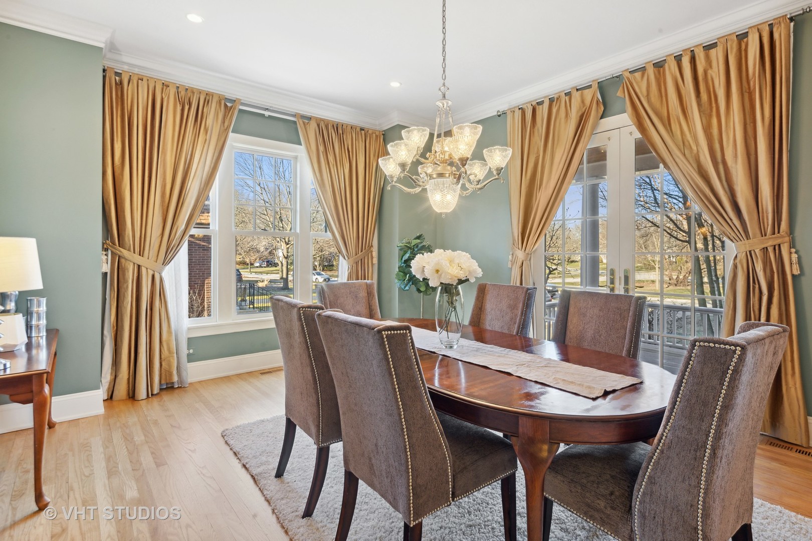 162 Akenside Road Riverside, IL 60546 - Photo 6 of 42 a view of a dining room with furniture window and wooden floor