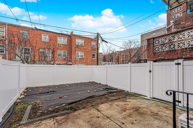 a view of a backyard of a house