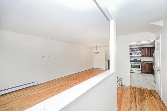 a view of kitchen and utility room