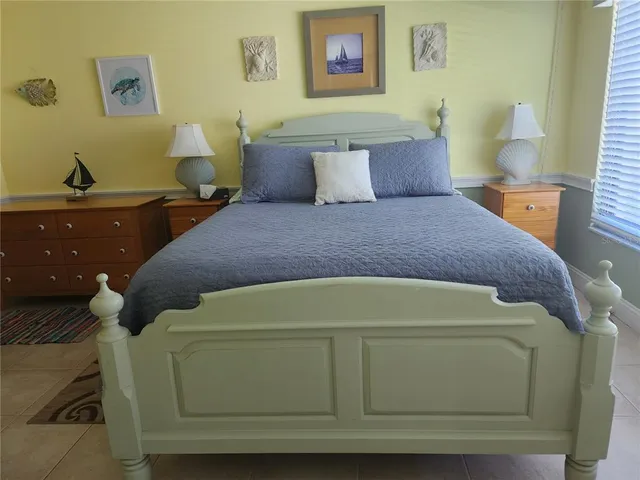 a room with furniture and flat screen tv