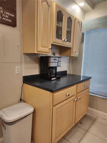 a bathroom with a toilet a sink and a mirror