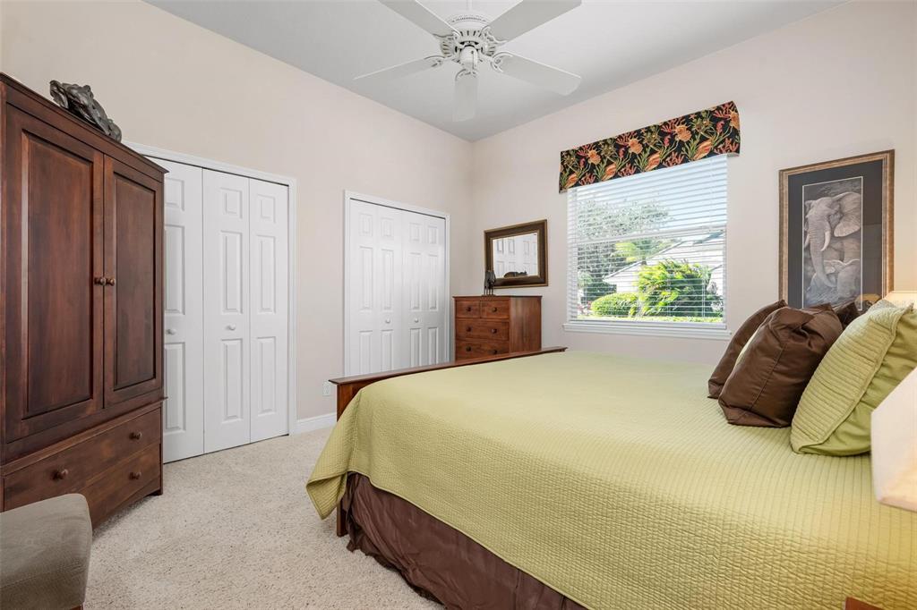 433 Tremingham Way Venice, FL 34293 - Photo 42 of 95 a bedroom with a bed and window
