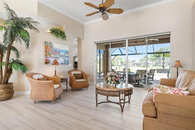 a kitchen with stainless steel appliances granite countertop a stove top oven a sink a refrigerator and a microwave